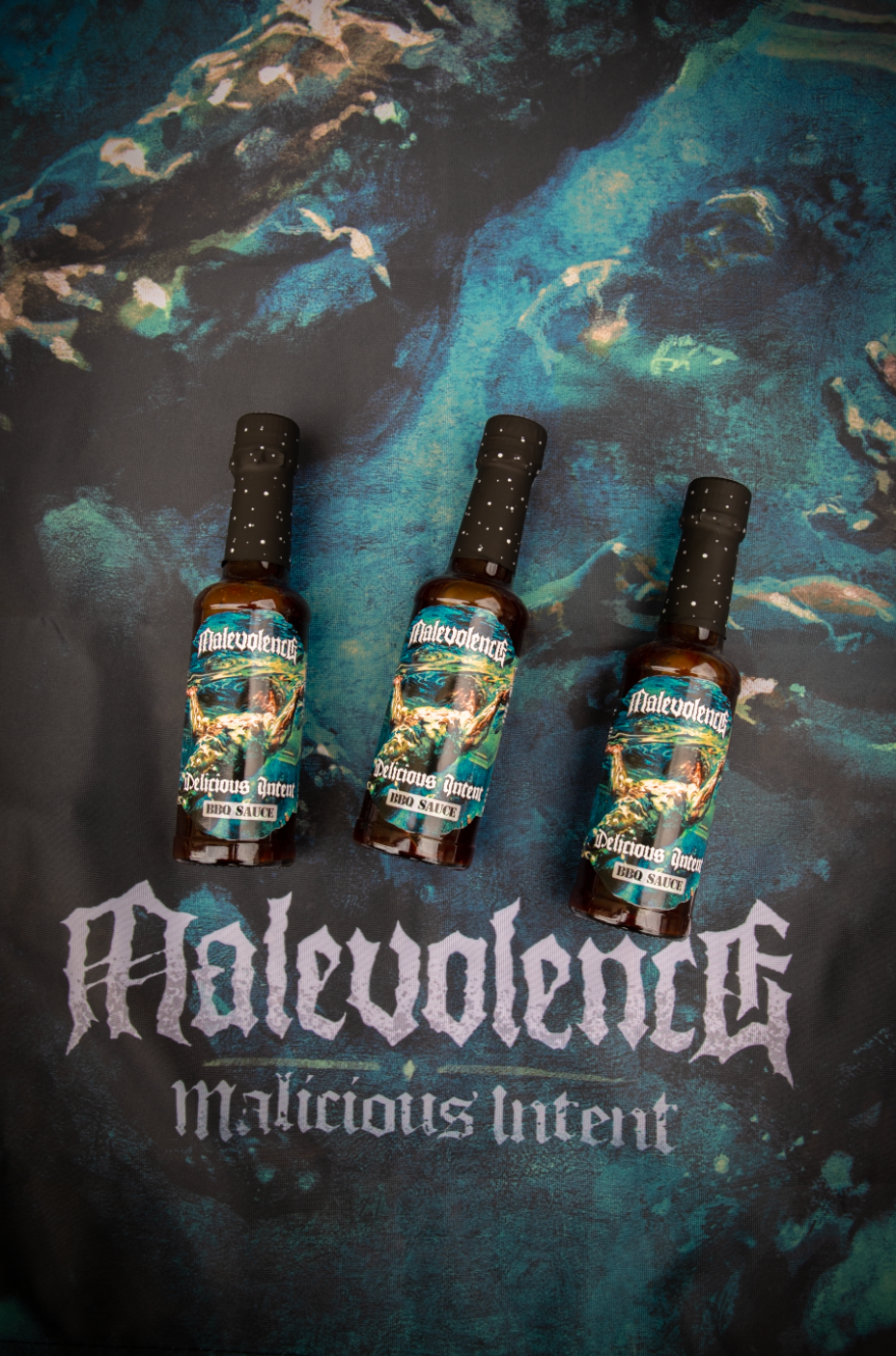 MALEVOLENCE X TUBBY TOMS DELICIOUS INTENT BBQ SAUCE